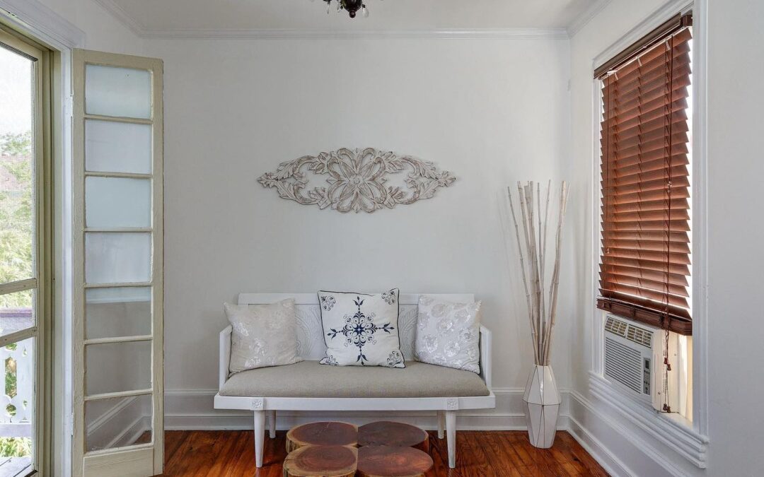 A quiet corner in The Velvet Rose Cottage, a lovely and oversized suite featuring a large sitting area, a Queen bed, eat-in kitchen, and a full bathroom with a shower over a clawfoot tub.