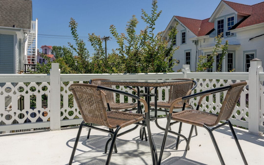 Morning coffee, golden hour wine, late-night chats. The porch at The Ashley Rose is the heart of every stay.