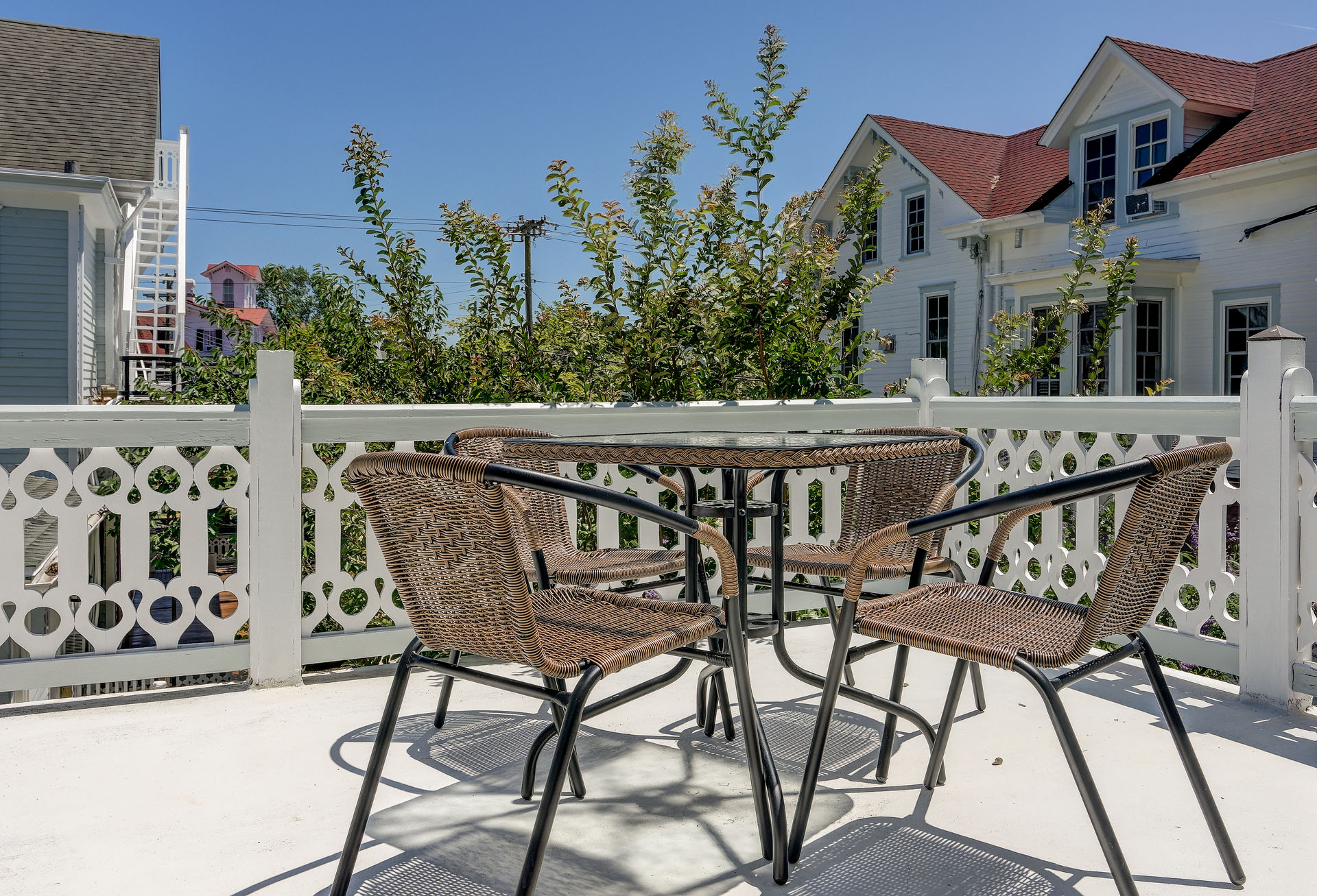 | Ashley Rose Morning coffee, golden hour wine, late-night chats.
The porch at The Ashley Rose is the heart of every stay.